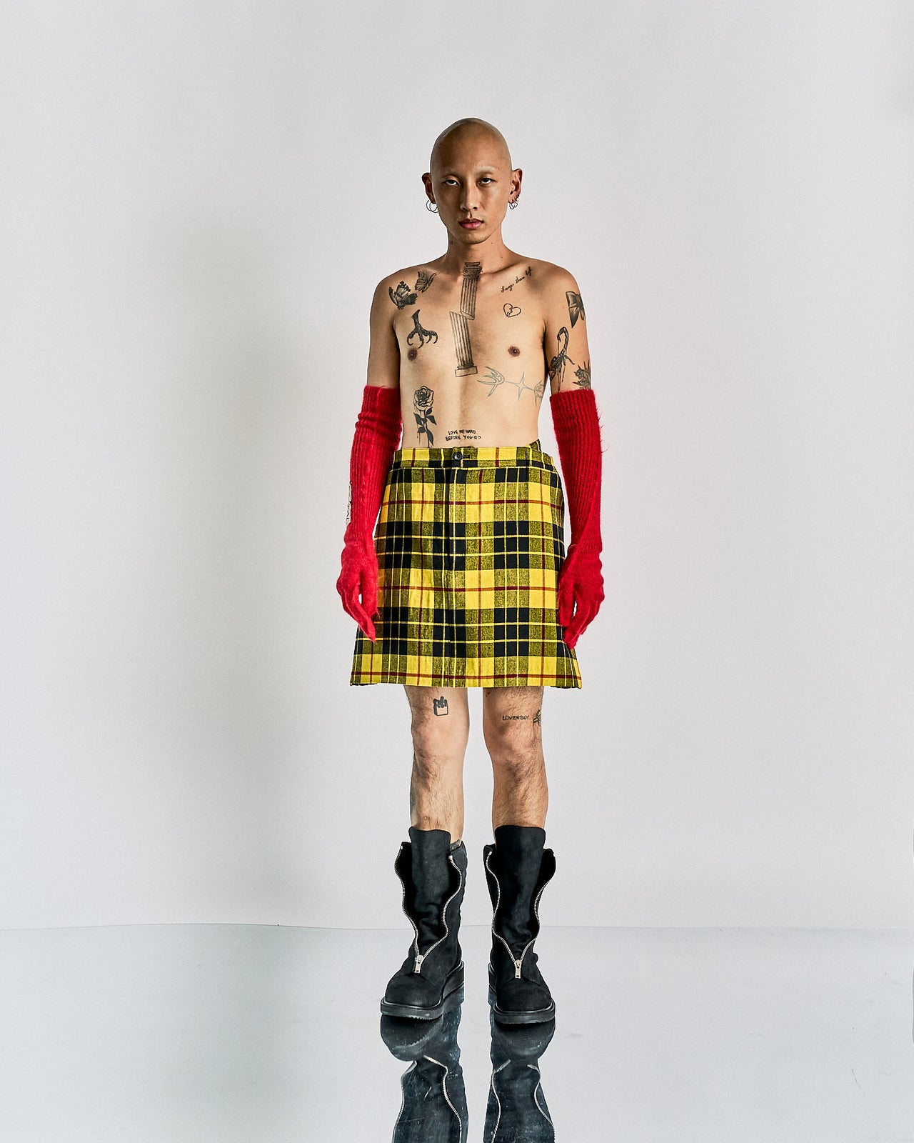 Comme des Garçons Junya Watanabe AW 2017 Runway look 45 tartan panelled skirt