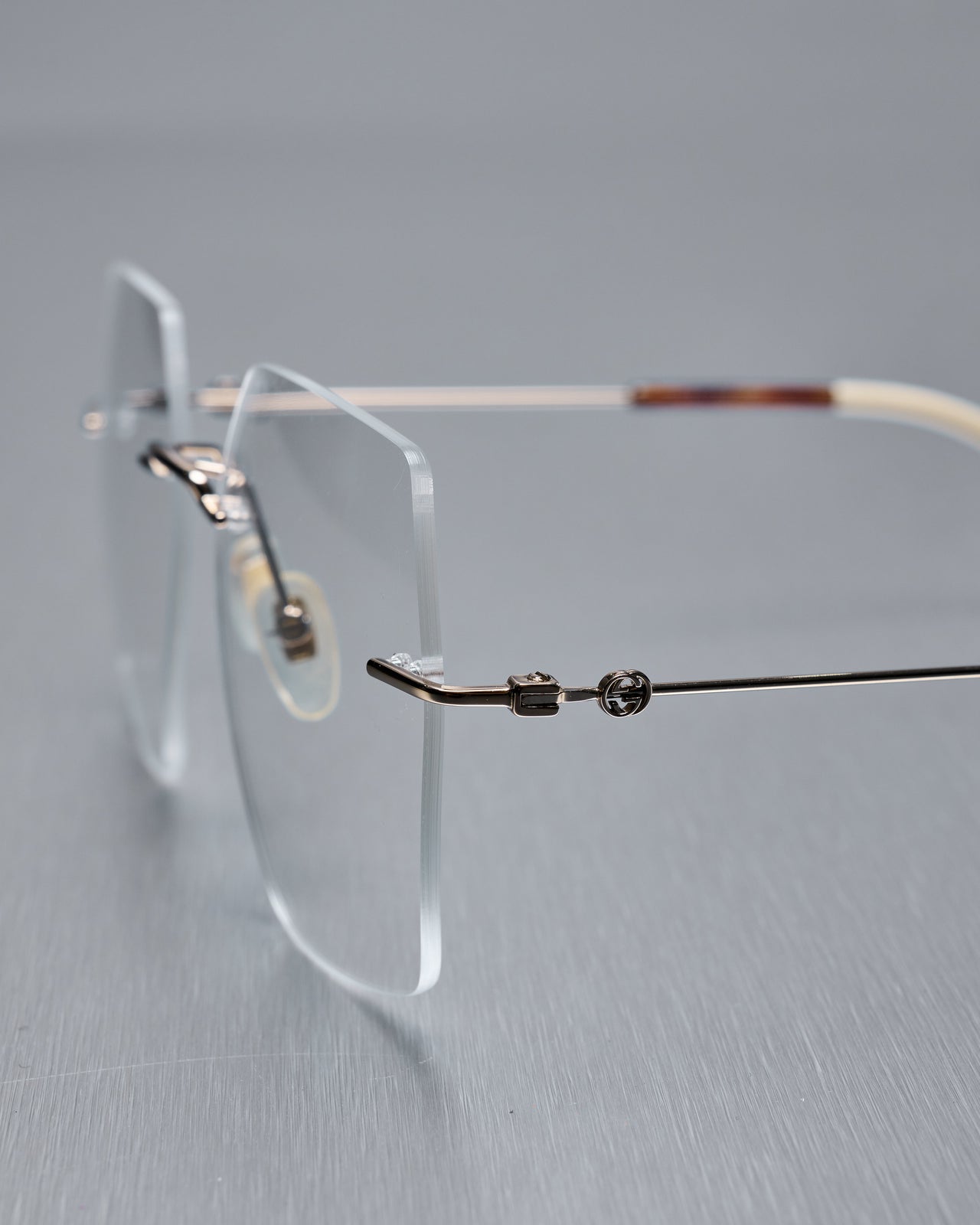 Gucci Frameless clear lense glasses GG0683O